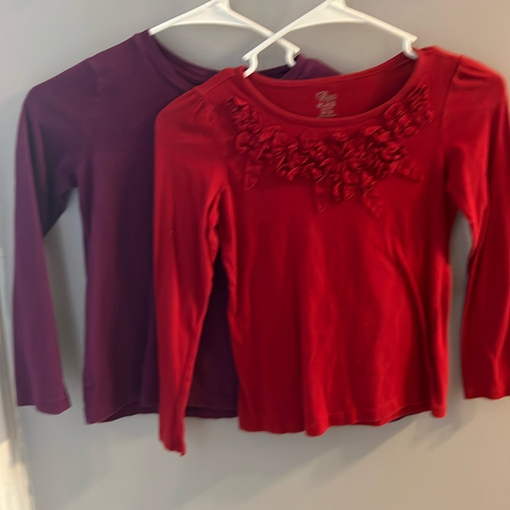 Two pack. Size 7 long sleeve shirts.